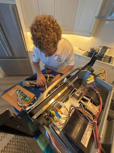 Gas range — burner ignition repair
