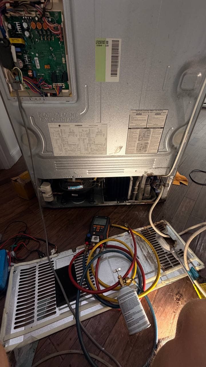 LG refrigerator water inlet valve replacement during leak repair in Naples Florida