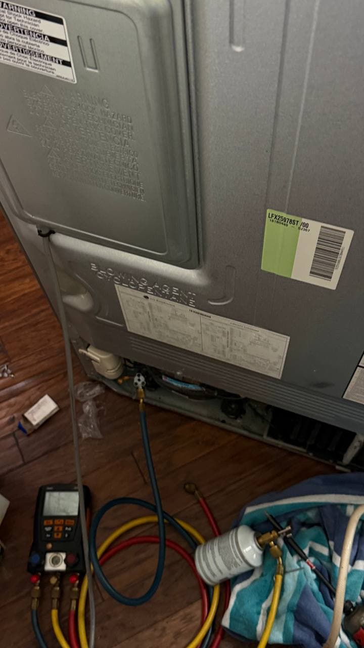 LG refrigerator defrost heater resistance test during refrigerator repair in Naples FL